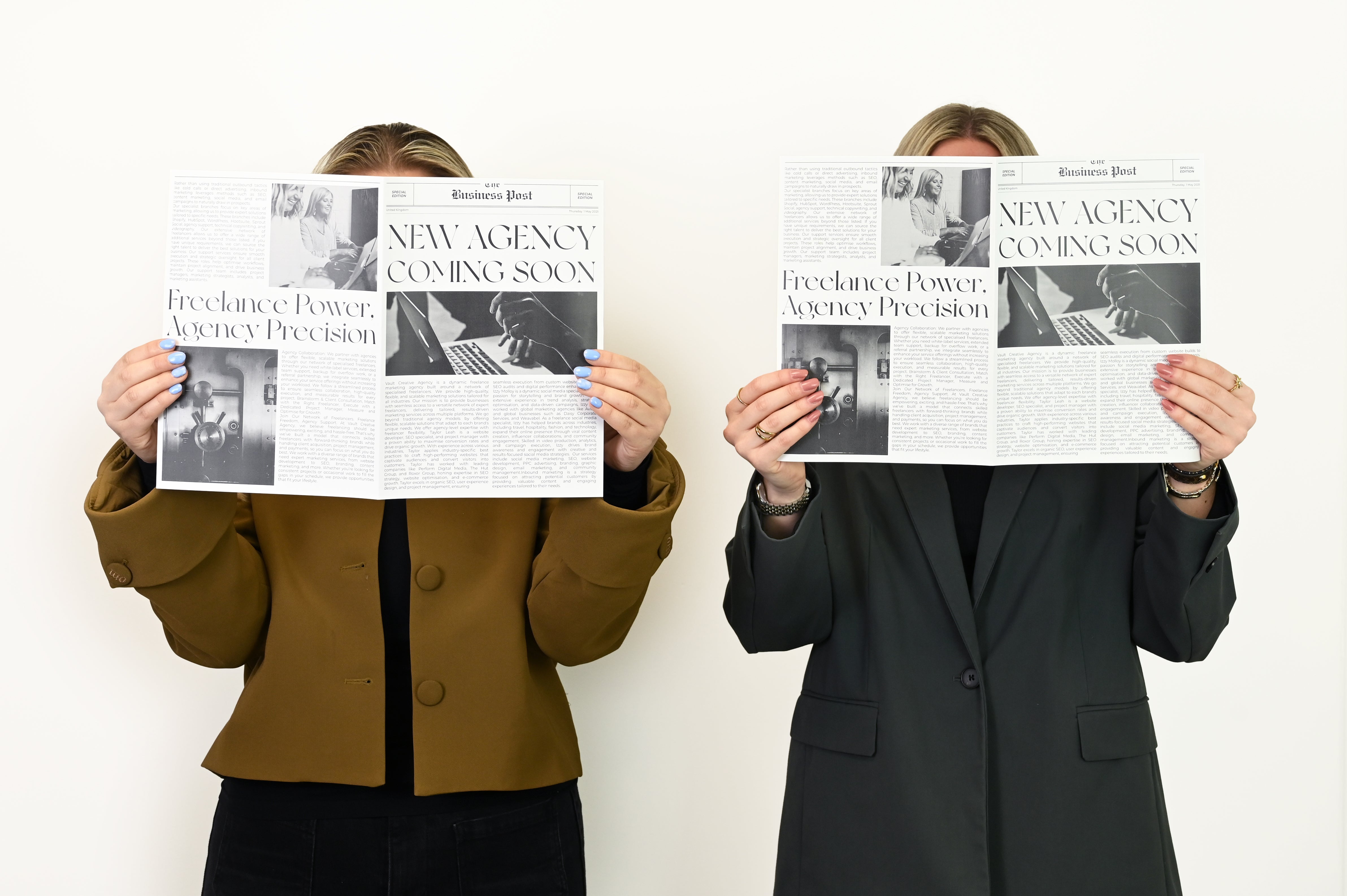 Vault Co founders candid photo of the reading the business post newspaper